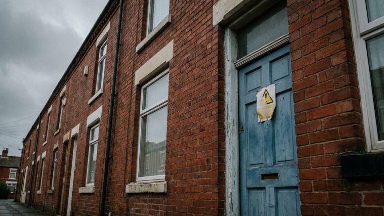 Housing inspection notice on terraced house door