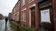 Neglected British terraced house with CPO notice