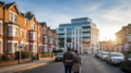 Couple viewing residential investment properties on British street