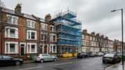 British terraced houses with construction scaffolding