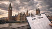 Exterior of the Palace of Westminster under dramatic clouds, with a petition document in the foreground and residential buildings visible in the background, symbolising housing policy debate.