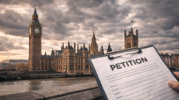 Exterior of the Palace of Westminster under dramatic clouds, with a petition document in the foreground and residential buildings visible in the background, symbolising housing policy debate.