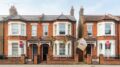 Sold signs connect terraced houses in property chain