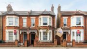Sold signs connect terraced houses in property chain