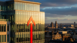 Office building with upward arrow reflecting market rate increases