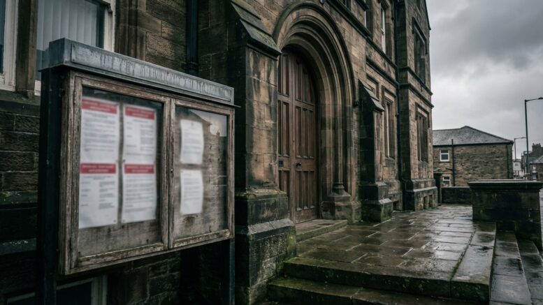 UK council building with enforcement notices on display