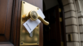 Council building door with FOI response delay notice