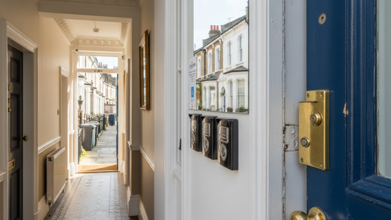 Victorian HMO entrance with multiple bells on UK terrace