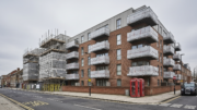 UK apartment block with scaffolding during safety works