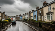 Welsh terraced houses under an overcast sky