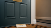 British flat doorway with complaint letter on mat