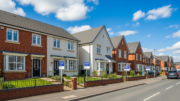 British terraced houses on a bright rental market street