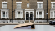 British townhouse with legal file in foreground