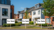 British rental homes and sale boards in summer light