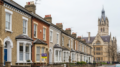 Terraced houses beside a British civic building