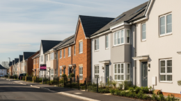 British terraced homes on a bright suburban street
