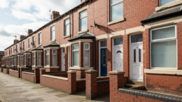Red brick rental terraces on a Merseyside street