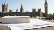 Blank postcards beside Westminster rental papers