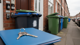 British terraced HMO with blue folder and keys