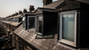Dormer windows on rental roof in summer heat