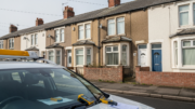 Damp-stained UK rental home under inspection