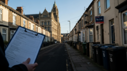 British rental street with council enforcement clipboard