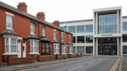 Welsh terraced rentals opposite a civic building