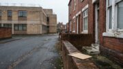 Worn British rental home opposite an unmarked council office