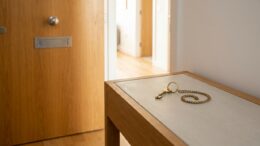 Brass keys at a UK rental flat entrance