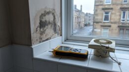 Scottish flat with damp wall and extractor fan