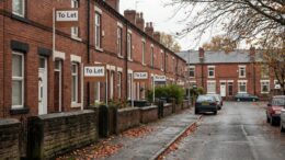 UK terraced street with To Let boards as rents fall